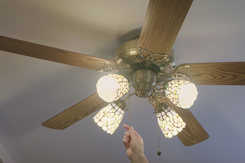 Video - Energy Saving Tip 2. Lit up brown ceiling fan.