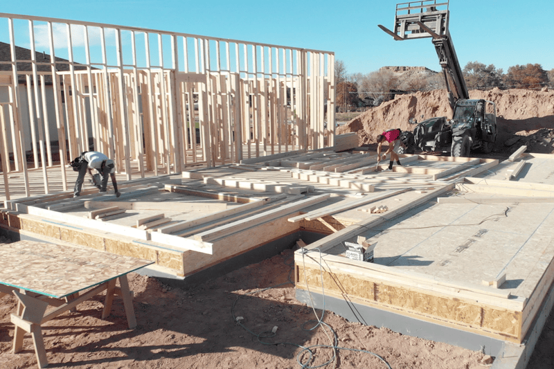 Building a new home is an exciting adventure, but it can get overwhelming. That’s why our team is ready to step in and help you select the best possible heating and cooling system for your home and budget. A framing structure for a new building.